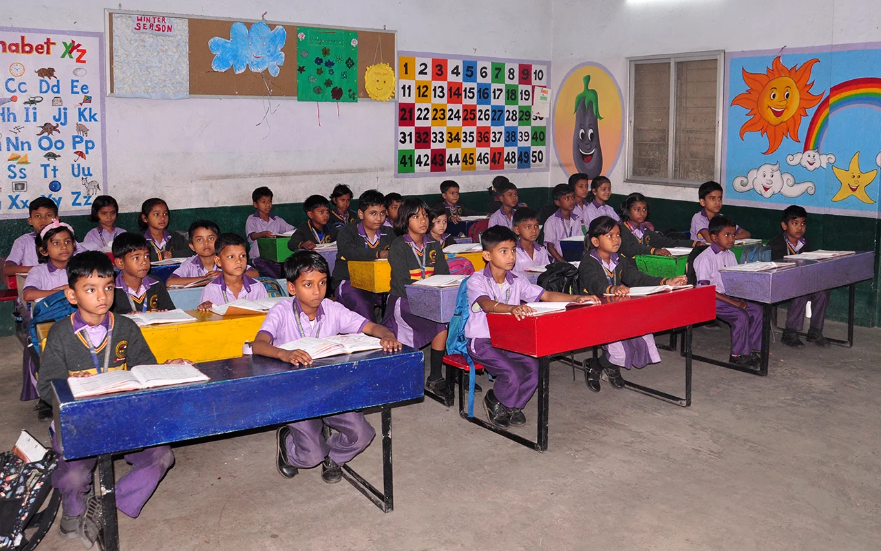 Students displaying health awareness posters during a school activity at Don Bosco Ramkanali